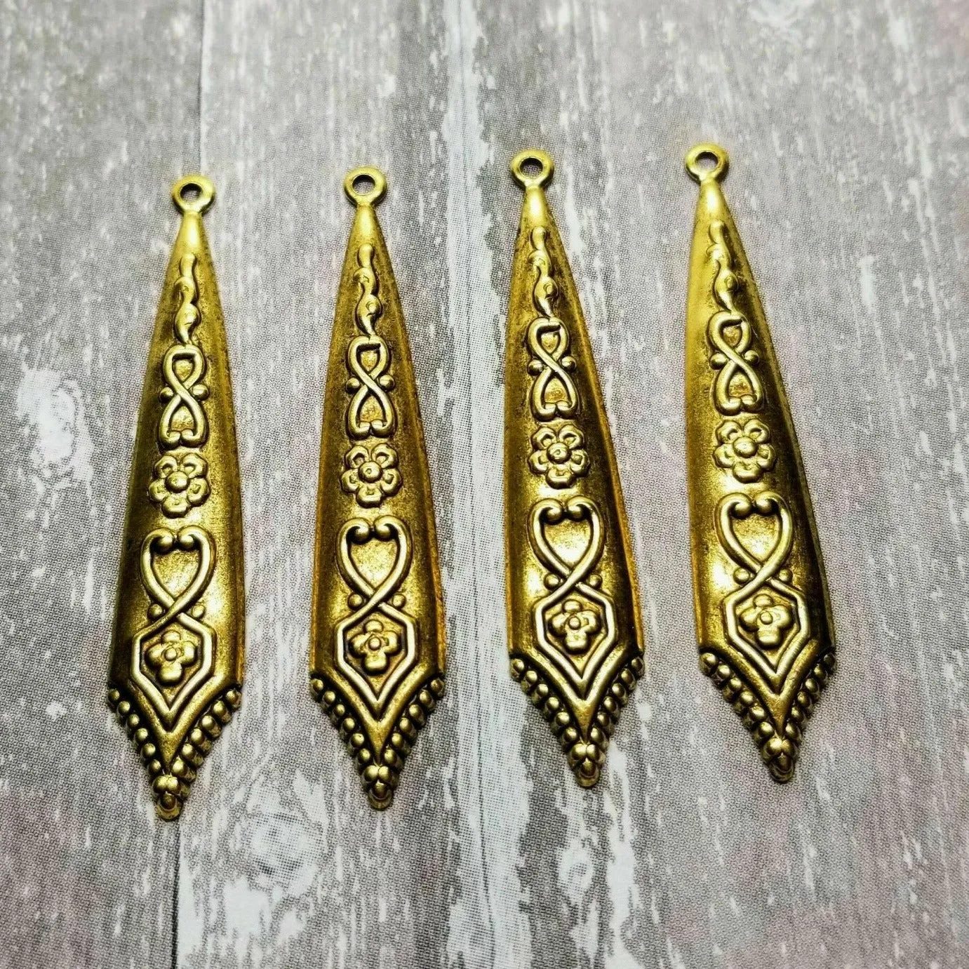 Brass Ornate Charms x 4- 8446S.